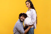 Caring indian man putting his ear on wife's pregnant tummy, listening to baby's, a Photo by Prostock-Studio (Thumbnail 1 of 2)