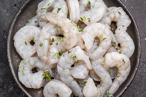 Uncooked prawns ready for gourmet cooking. Dark, moody shot with, a Food & Drink Photo by composter-box@mail.ru