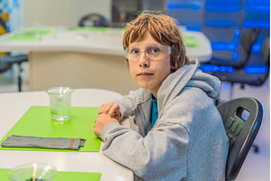 Teenage boy wearing safety glasses, a Technology Photo by Elizaveta Galitskaya