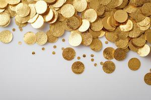 Golden glitter confetti on white bac, a Photo by Pixeness Studio