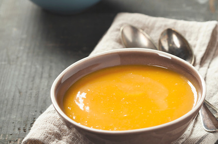 Pumpkin soup in a bowls on a wooden surface, a Food & Drink Photo by Natalia Klenova's Shop