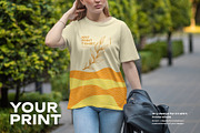 Mockup T-Shirt on a Girl on the Walk, a Shirt Mockup by Grow Design Craft Studio (Thumbnail 4 of 7)