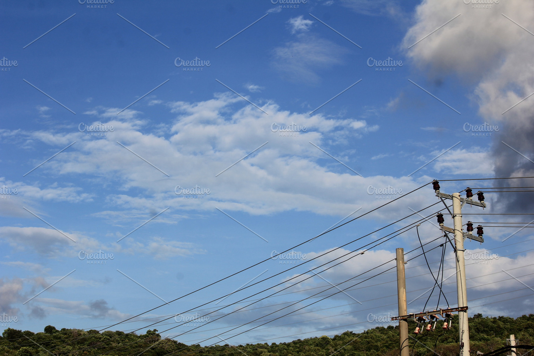 Power Lines Stretching Across the Bl, an Industrial Photo by bastera