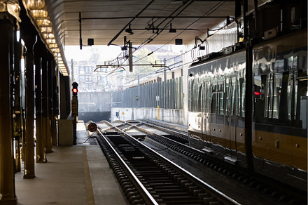 A subway station with a parked train, an Architecture Photo by Barcelona_dreams