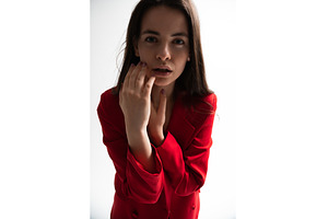 Young woman covering her face with, a Person Photo by volodymyrshtun13795