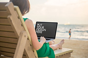 Girl on the Beach with Laptop, a Mac Mockup by UI Kitchen (Thumbnail 1 of 6)
