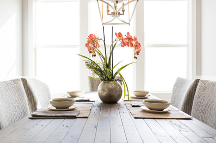 Orchids with place setting containing agent, airy, and art, a Food & Drink Photo by Water Street Photography