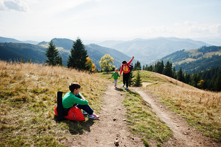 Woman is traveling with a childrens. Mom in the mountains. Climb, a Person Photo by AS photostudio