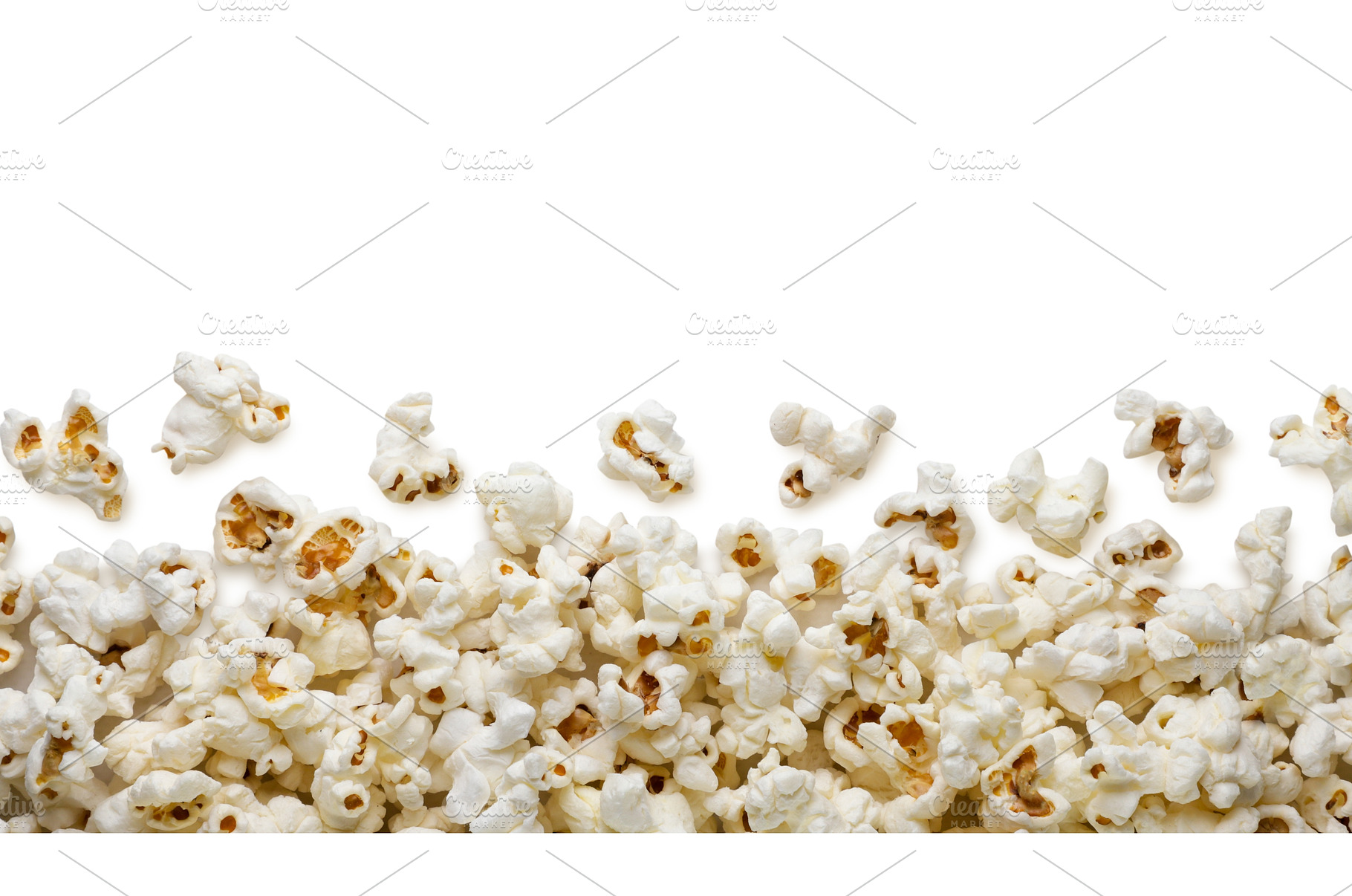 Popcorn scattered on a white, a Food & Drink Photo by innakreativ