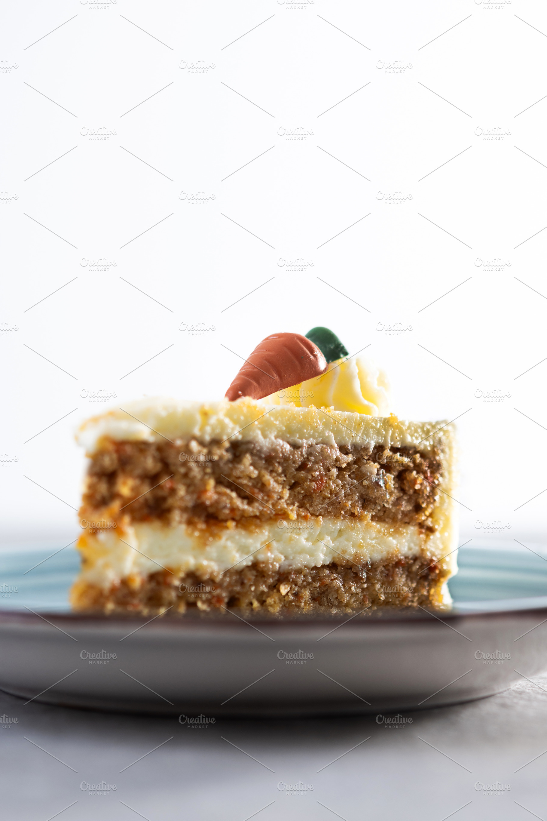 Carrot cake slice with cream cheese frosting, a Food & Drink Photo by etorres69