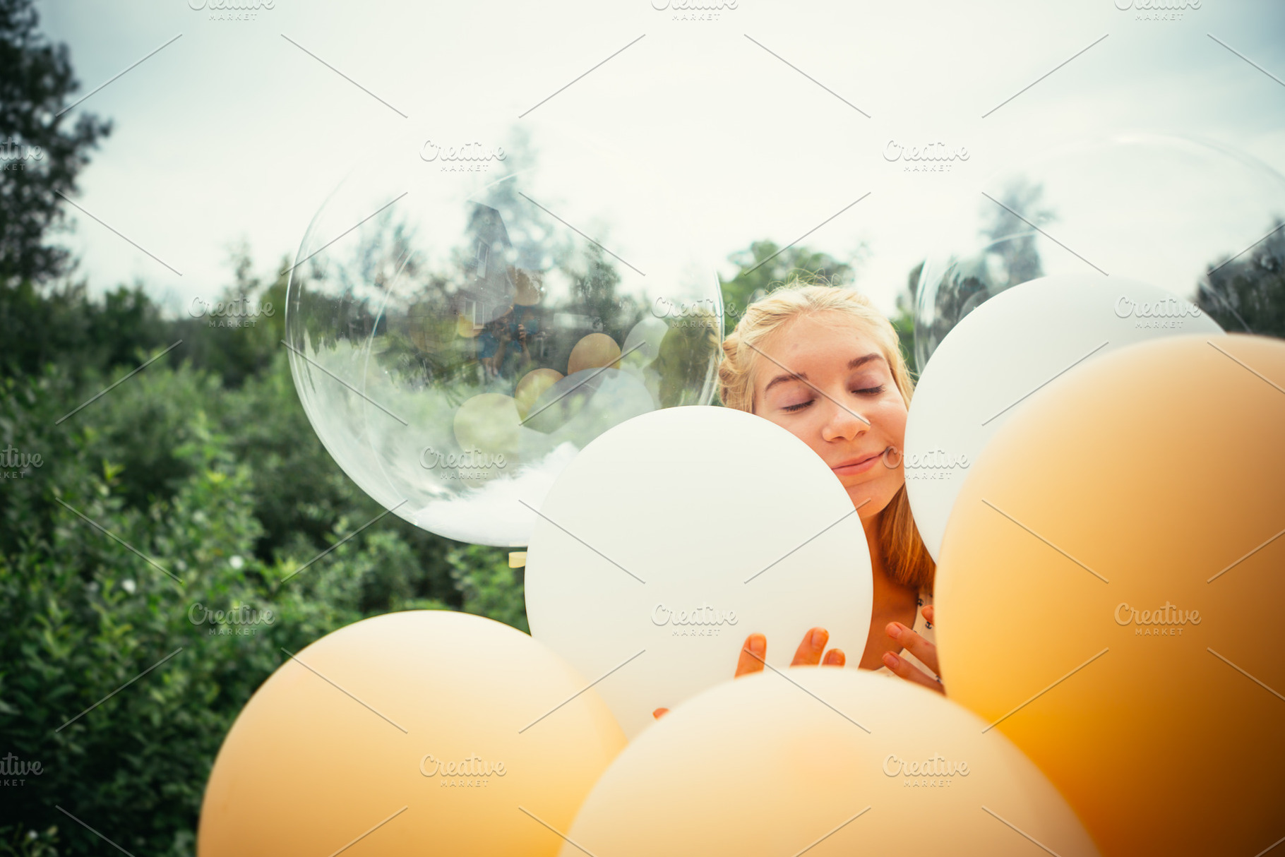 Portrait of young girl with balloons stock photo containing girl and happy, a Person Photo by ruslan117