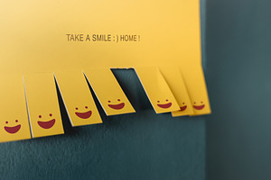 Yellow note with smiling faces.kindness, emotional support, empa, a Photo by salmon.black