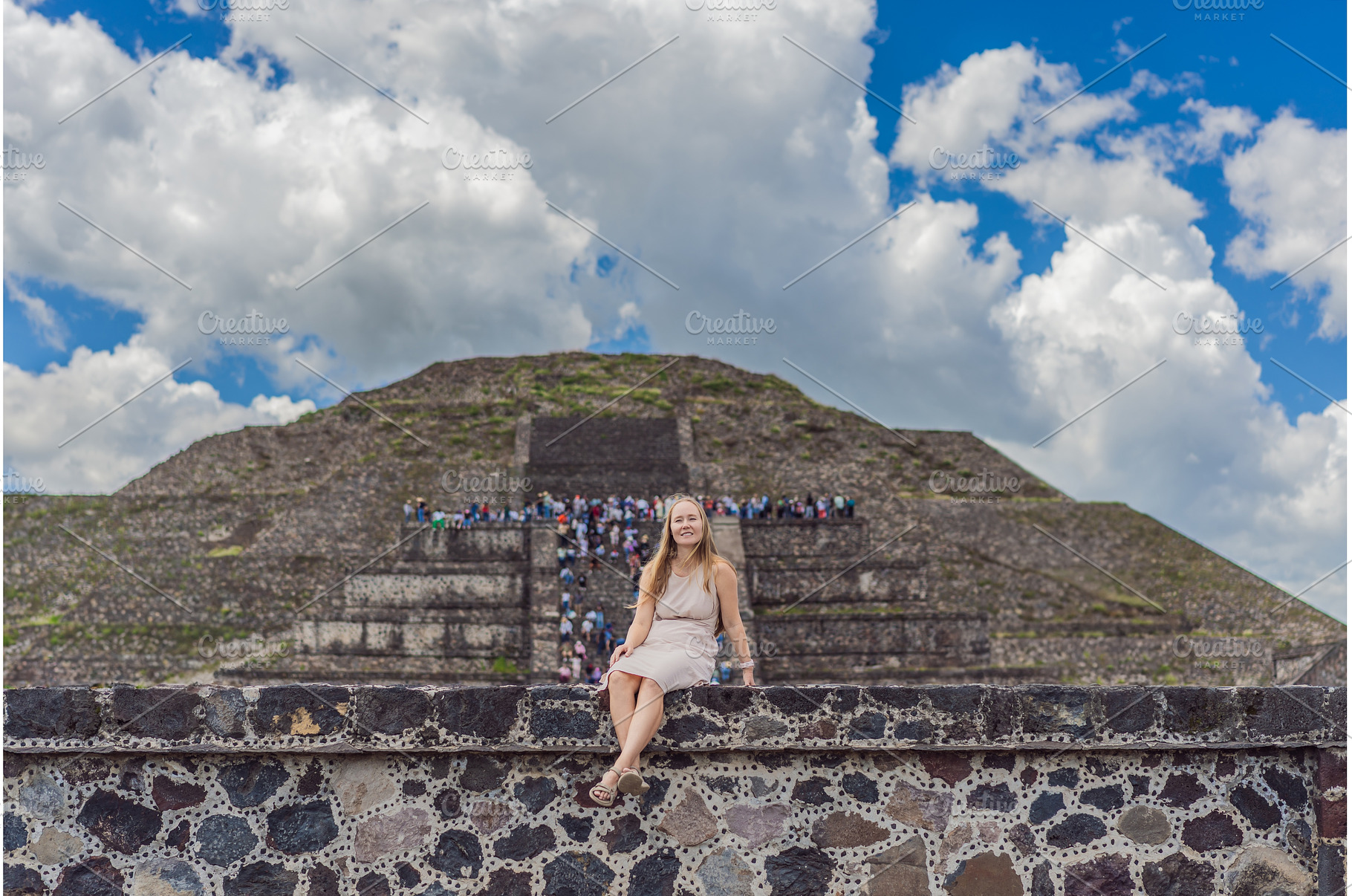 Female tourist standing in front of, a Person Photo by Elizaveta Galitskaya