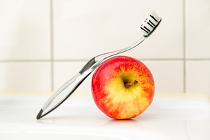Design toothbrush with apple.