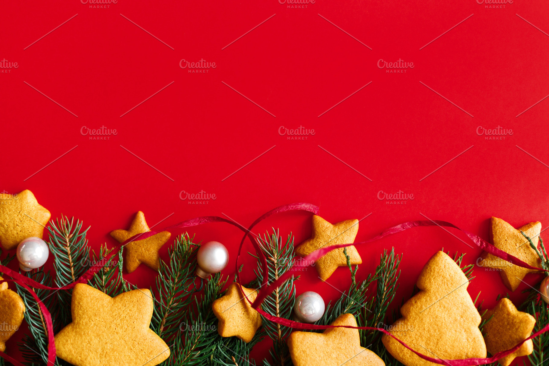 Christmas gingerbread cookies with pink baubles and evergreen br, a Photo by Sonjachni