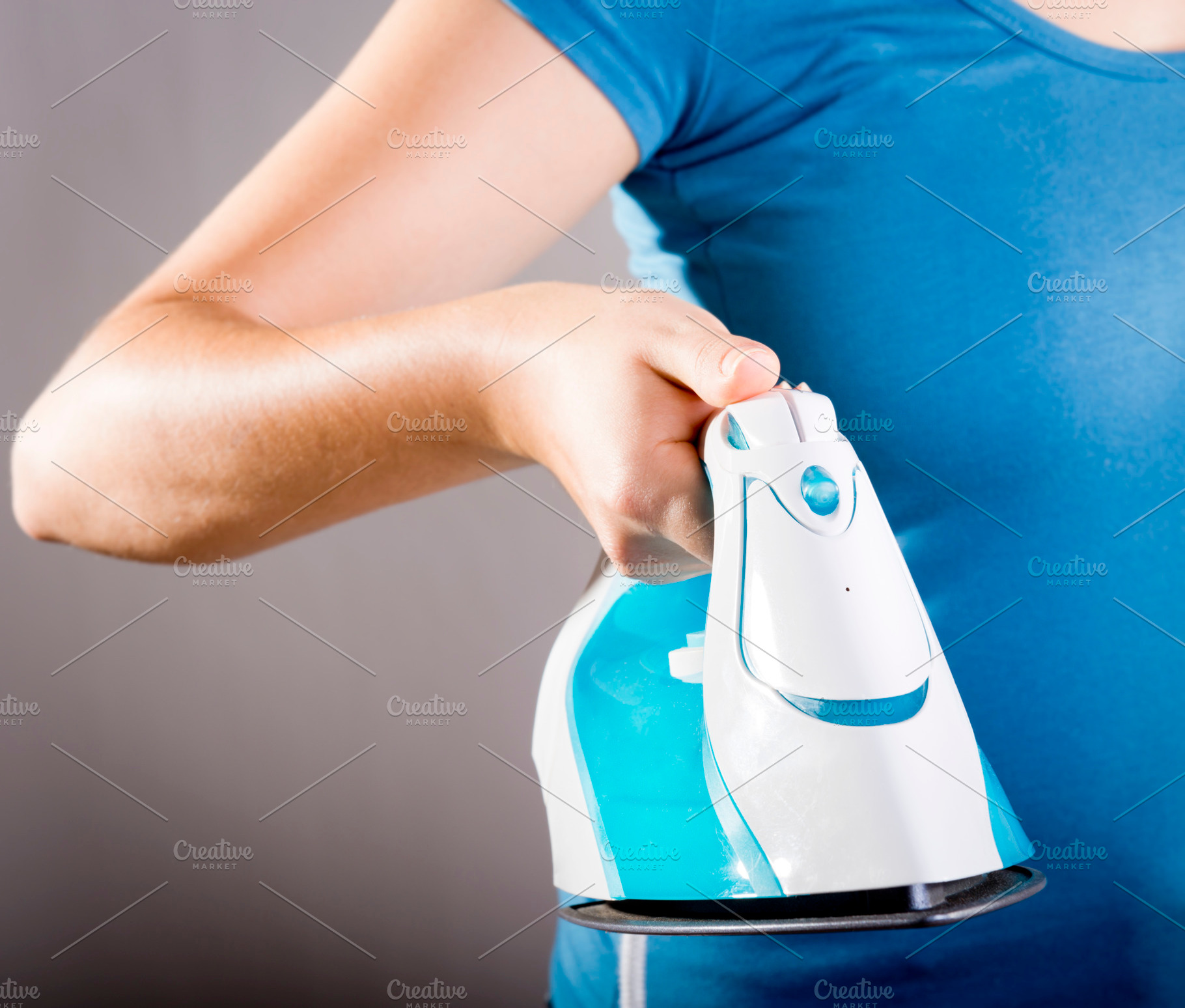 Woman Ironing, a Person Photo by THP Creative