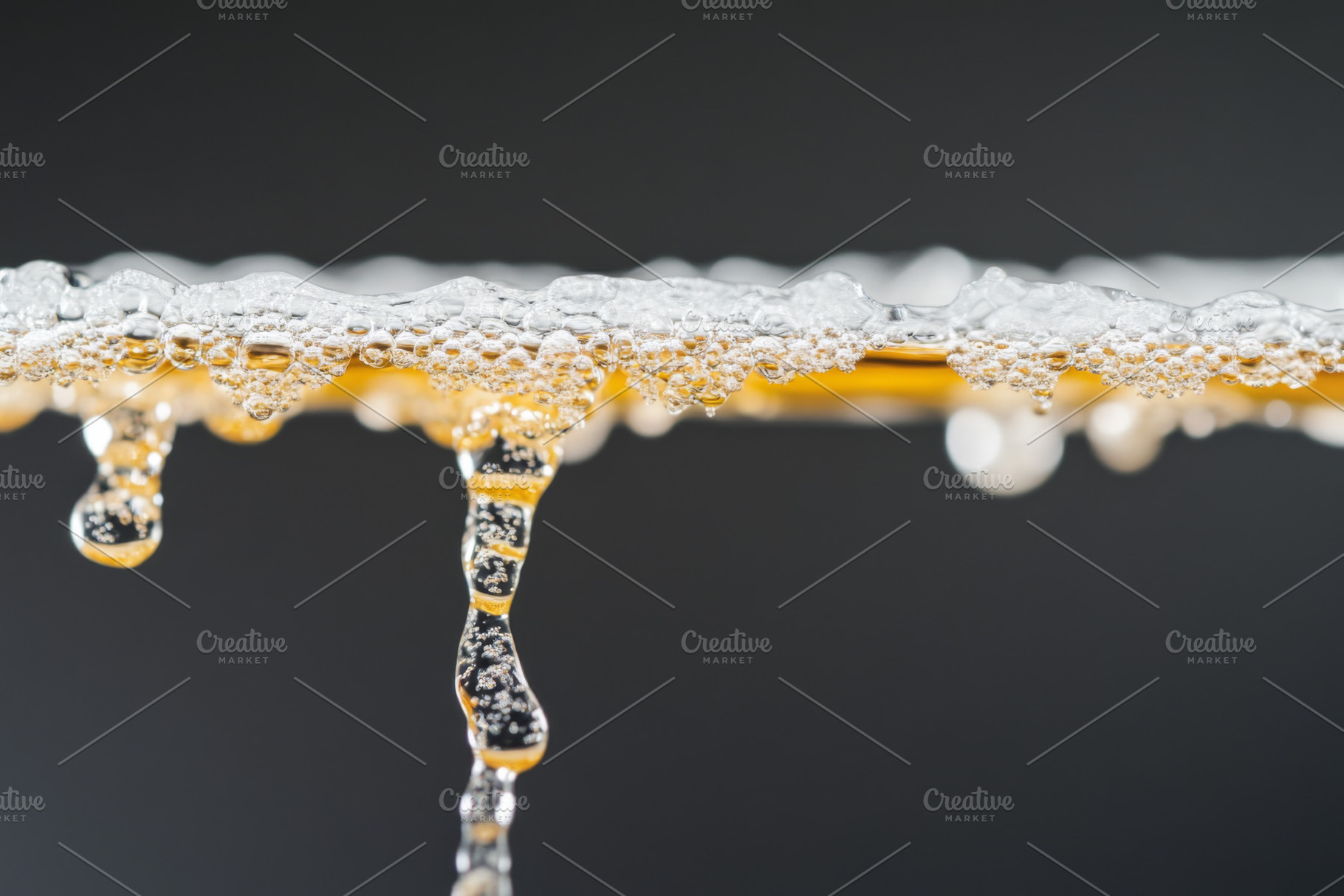 Close-up of water and amber-colored, a Photo by Dvoevnore photos