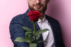 Man Offering Red Rose, a Person Photo by Ales Munt