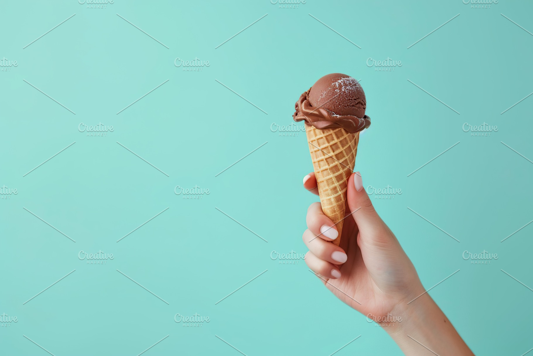 Chocolate ice cream in waffle cone in female hand, a Food & Drink Photo by AlyaAnd
