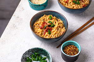 Korean trendy spicy carbonara ramen, a Food & Drink Photo by Yulia Furman