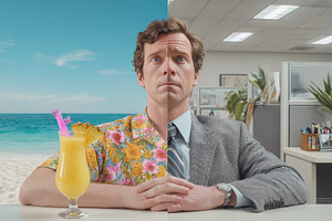 Man split between beach vacation and, a Photo by Pixeness Studio