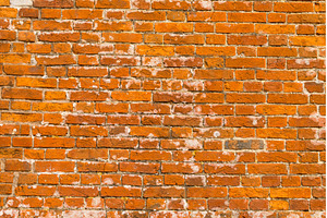 Close up of an ancient brick wall, a Background Photo by Backyard Stock
