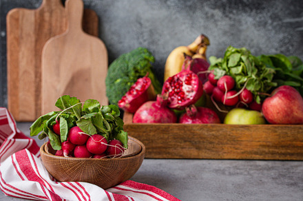 Radish bunch with fruit and veggies on kitchen table, a Food & Drink Photo by its_al_dente