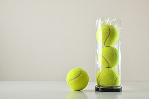 Stacked Tennis Balls in Clear Tube, a Sports & Recreation Photo by Davizro's Market