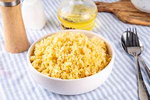 Boiled bulgur pilaf, healthy wheat garnish, a Food & Drink Photo by Rimma