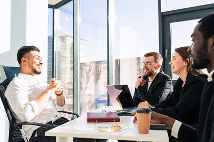 Office team listening, a Photo by borodai94