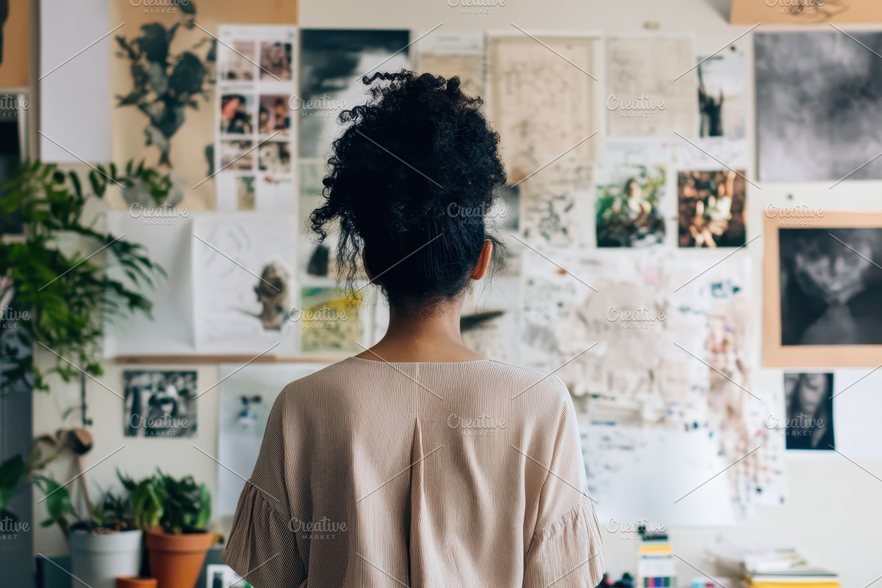 Woman in creative space curates, a Photo by Pavel_design