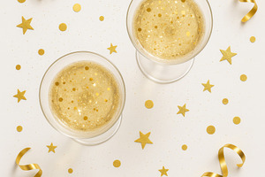 Two glasses champagne and gold decor, a Photo by Dvoevnore photos