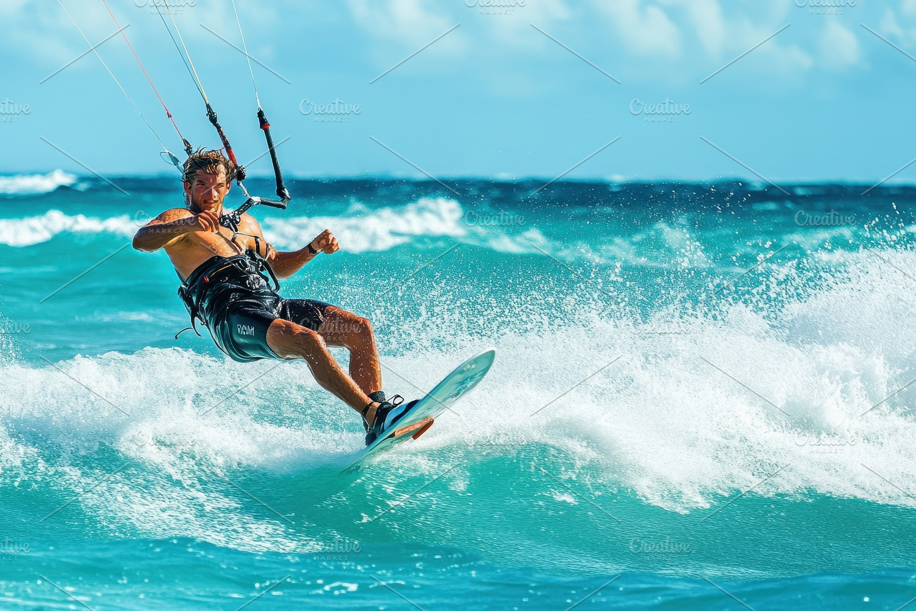 Young man showcases skill while kite, a Photo by Pavel_design
