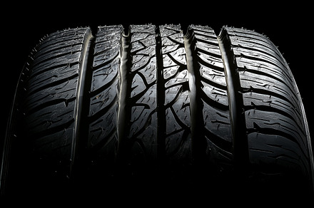 Close up on brand new car tire with, a Transportation Photo by MistyDay