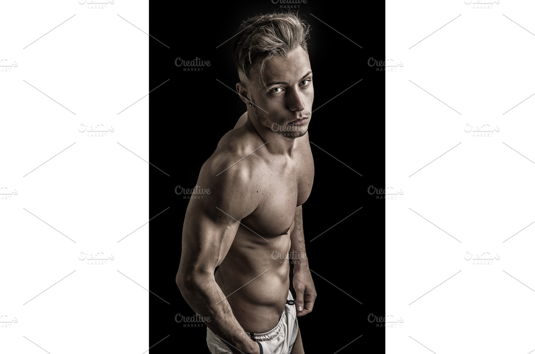 Lean athletic shirtless young man, a Person Photo by ArtOfPhotos photo store