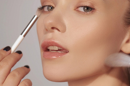 Natural makeup cosmetic applying woman brush face, a Beauty & Fashion Photo by Photo Drive Studio