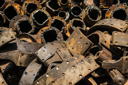 Closeup view of pile of old rusty metal scrap, an Industrial Photo by Vapi