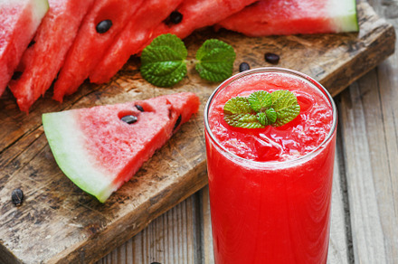Watermelon smoothie on wood background and healthy for you containing