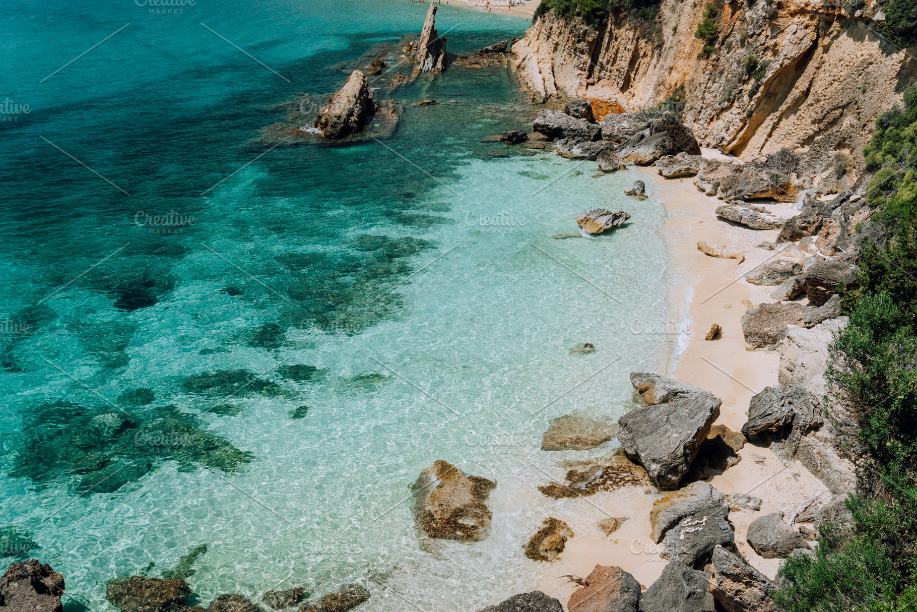 Hidden empty beach with pure clear containing beach, turquoise, and gialos, a Nature Photo by Igor Tichonow