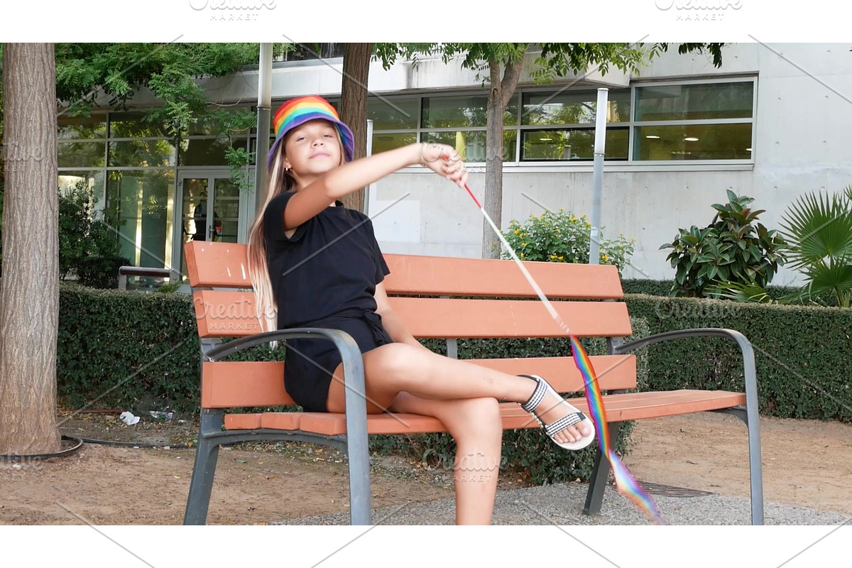 A colorful video shows young girls, a Graphic by Jyliana's shop (Photo 1 of 2)