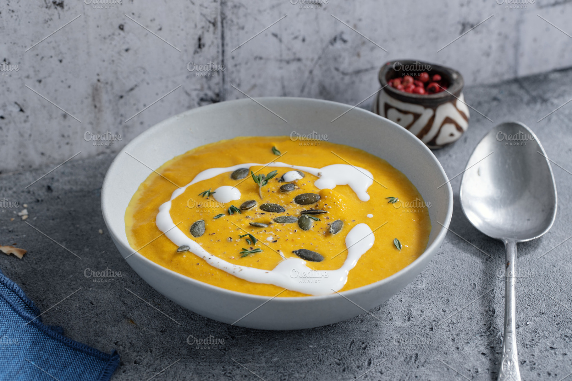 Pumpkin vegetable soup with cream, a Food & Drink Photo by Valeria Art