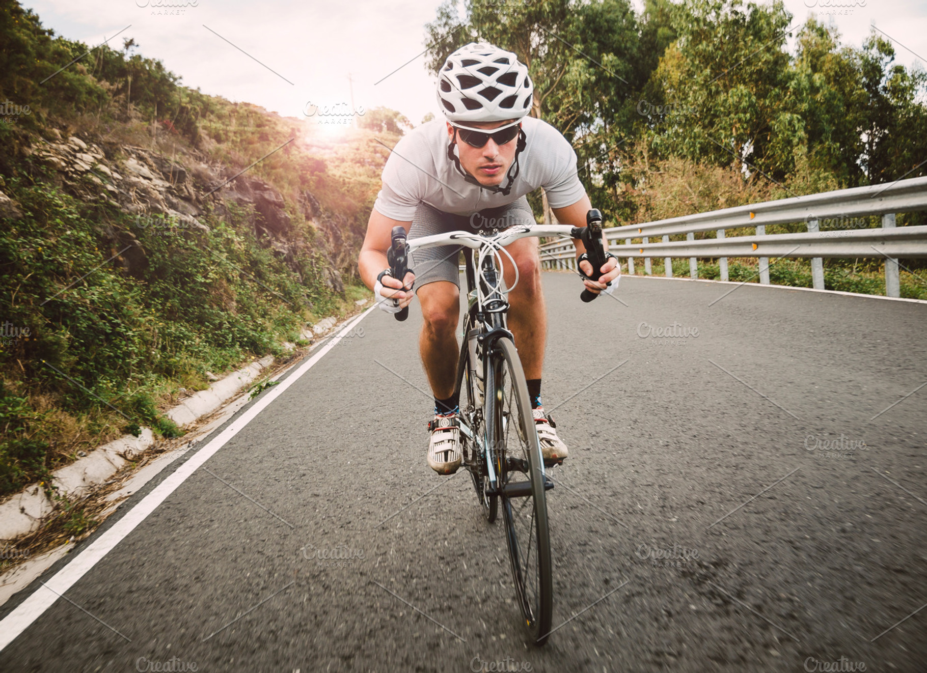 Cyclist pedaling on a racing bike featuring cyclist, cycling, and effort, a Sports & Recreation Photo by Photoweb00