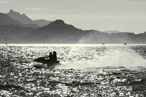 Silhouette personal watercraft ride, a Sports & Recreation Photo by SkyNext