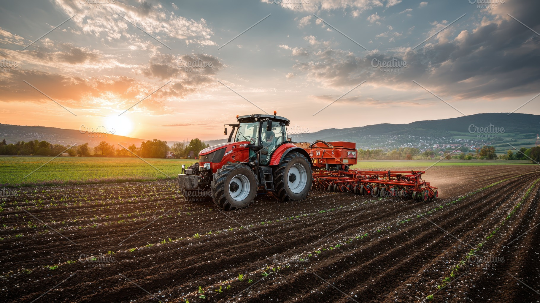 Red tractor planting seeds at sunset, a Photo by Pixeness Studio