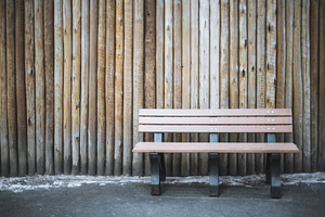 Wooden bench against timber wall, an Architecture Photo by SkyNext