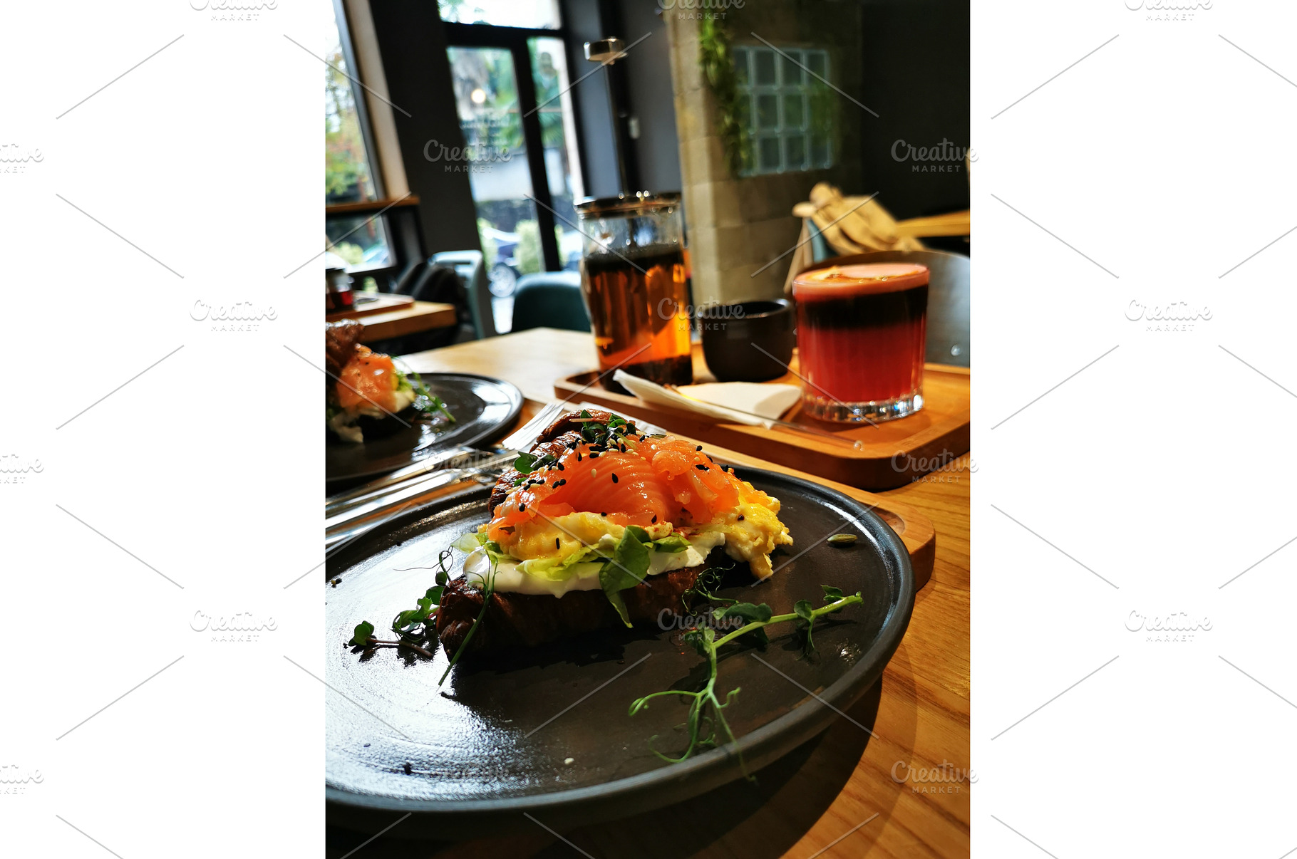 Croissant with salmon, egg, a Food & Drink Photo by sceptical cactus