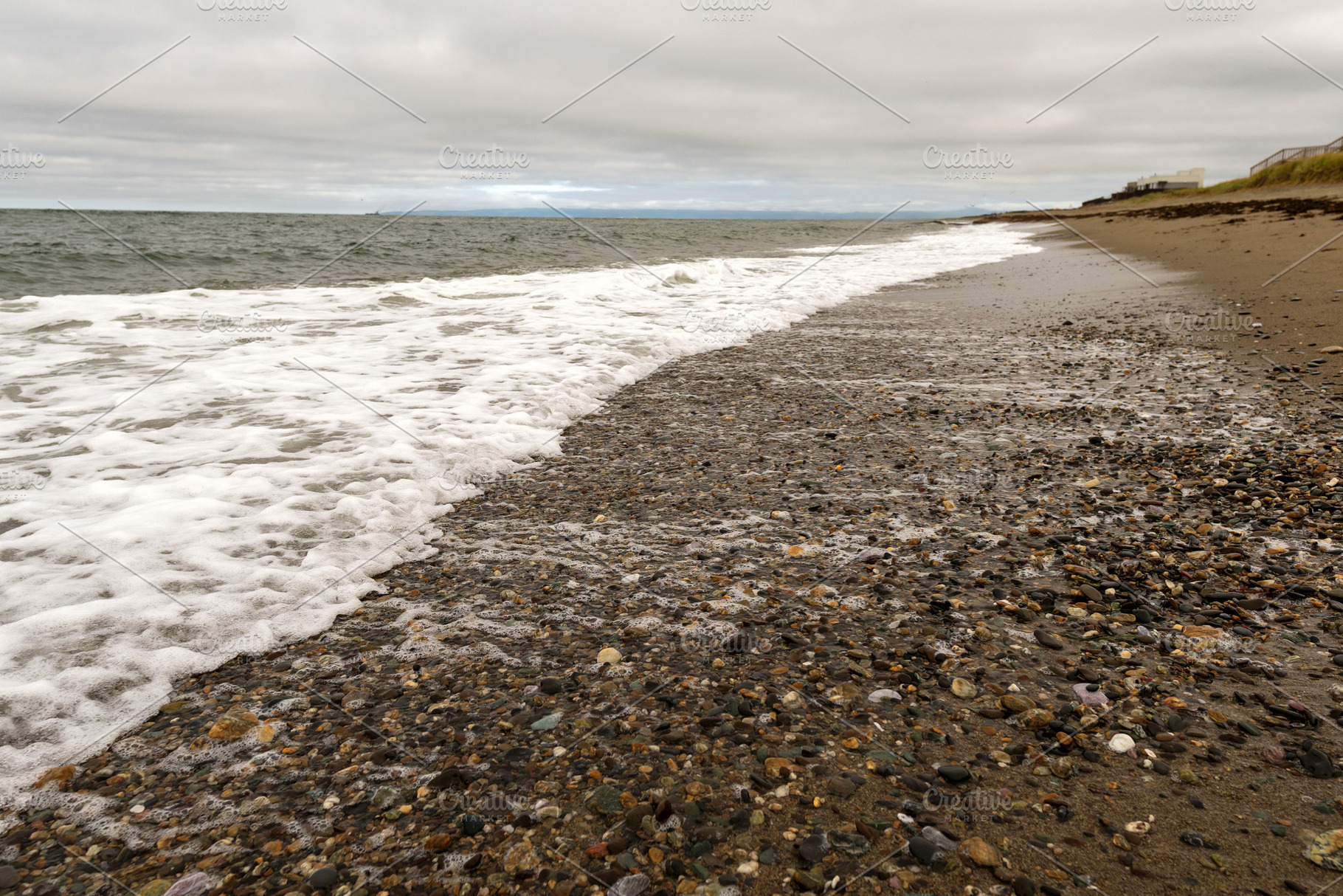 Ocean waves washing over pebble, a Nature Photo by Elena Vagengeim