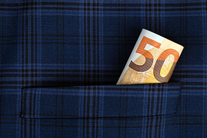 Fifty euro banknote sticking out of a blue plaid pocket, symbolizing savings, f, a Business Photo by Ales Munt