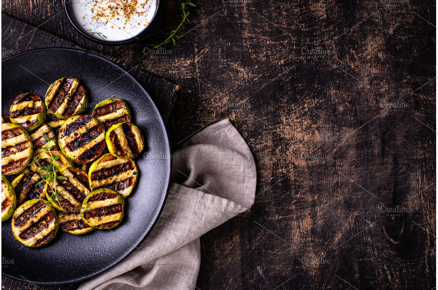 Grilled zucchini with sauce, vegan, a Food & Drink Photo by Yulia Furman