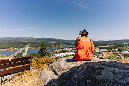 Woman contemplating the landscape from a mountain, a Person Photo by rubenchase